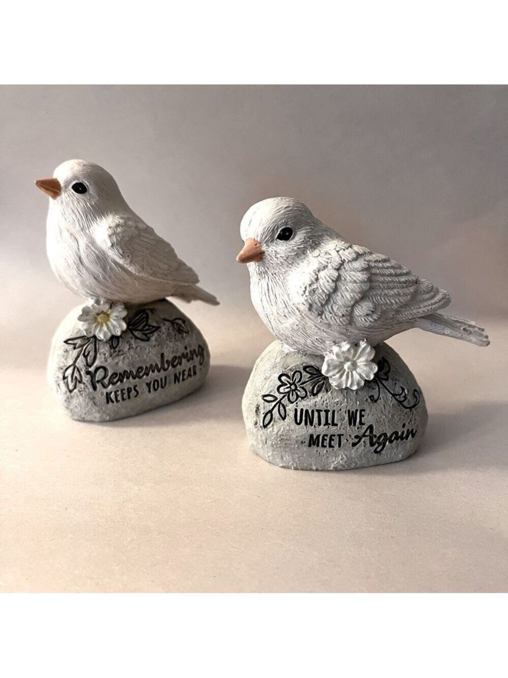 Pair of resin memorial birds with endearing inscriptions